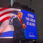 Billboard in Israel showing Donald Trump before U.S. and Israeli flags with the text “Cyrus the Great is alive!”, part of a national campaign linking Trump to the biblical Cyrus from Isaiah 44:28.