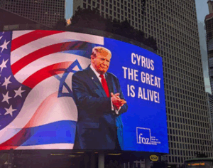 Billboard in Israel showing Donald Trump before U.S. and Israeli flags with the text “Cyrus the Great is alive!”, part of a national campaign linking Trump to the biblical Cyrus from Isaiah 44:28.